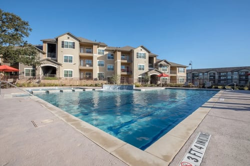 Swimming pool at Ten 06 at Joshua Station Apartments, TX, 76058