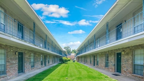 Garden style apartments overlooking manicured grass
