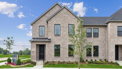 Exterior of the CB JENI Homes model home at Painted Tree Woodland District in McKinney, TX.