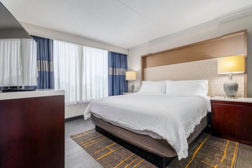 King Bed Suites offer a separate bedroom from the living room area