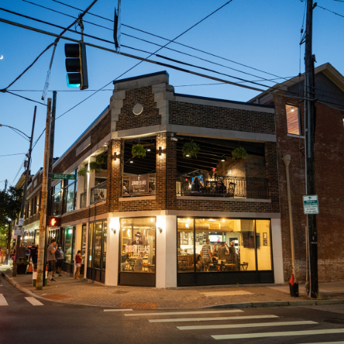 Exterior view of two-story Goodfellas Pizzeria in Pleasant Ridge, Cincinnati.