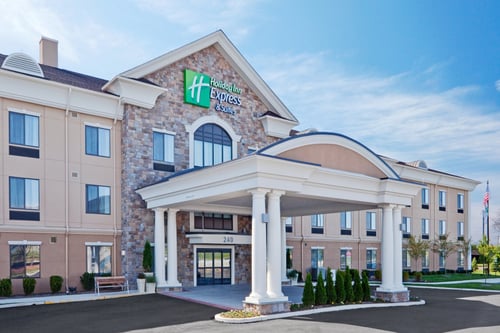 The exterior entrance of the Holiday Inn Express & Suites.