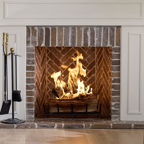 A picture of a fire in a fire place.
