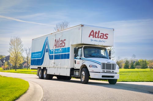 Moving truck arriving in neighborhood